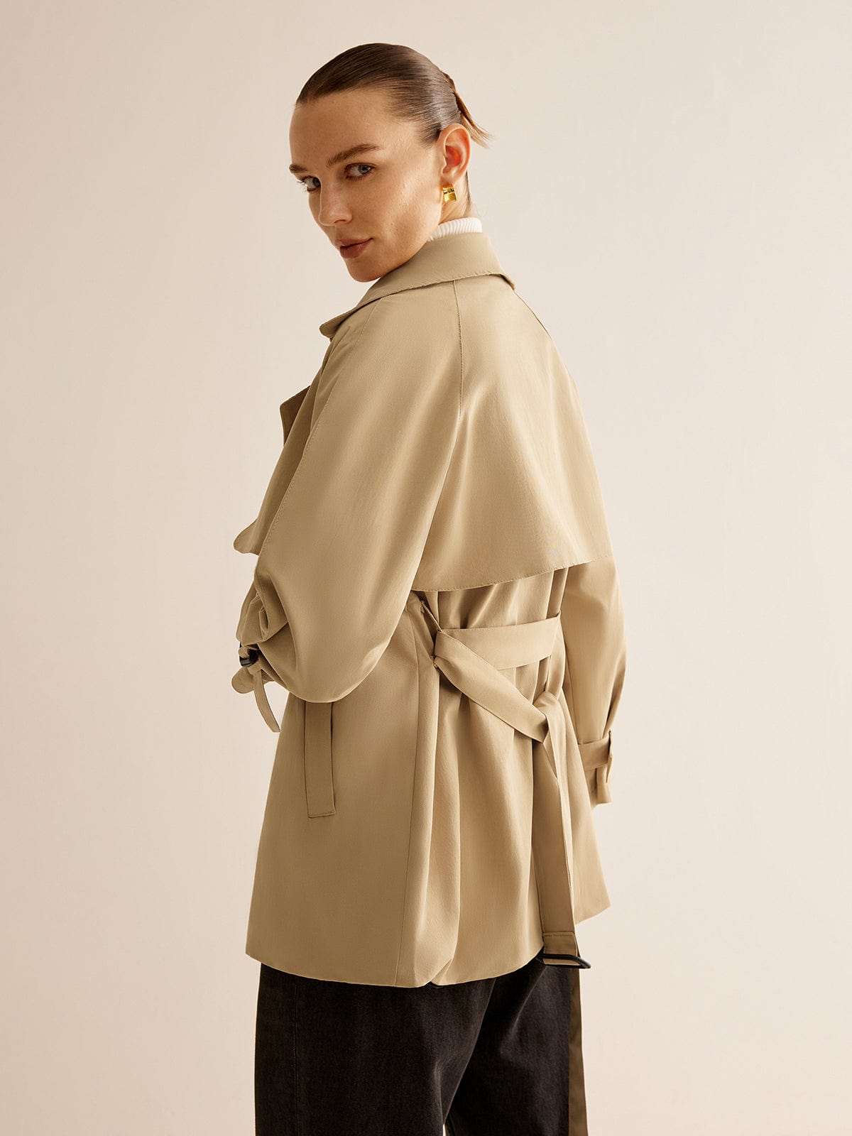 Trench-coat à boucles